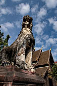 Chiang Mai - The Wat Phan Tao temple, the Sing shaped Guardian at the entrance.  